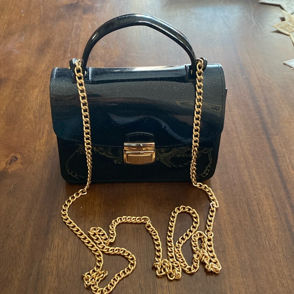 BP. Rubber crossbody bag